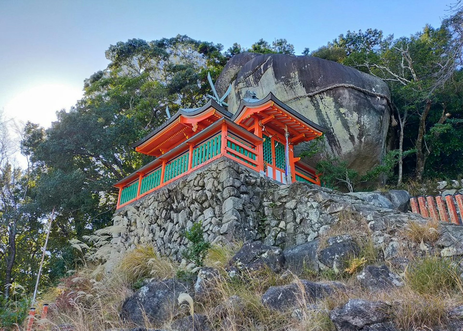 Kamikura Shrine is a traditional Shinto shrine built into a hillside in rural Japan.